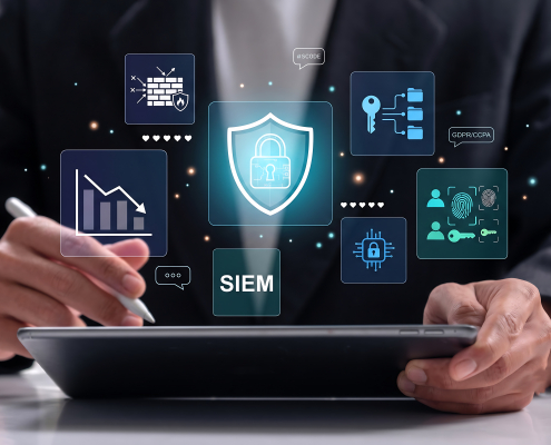 Business professional using tablet for SIEM cybersecurity and network data protection analysis